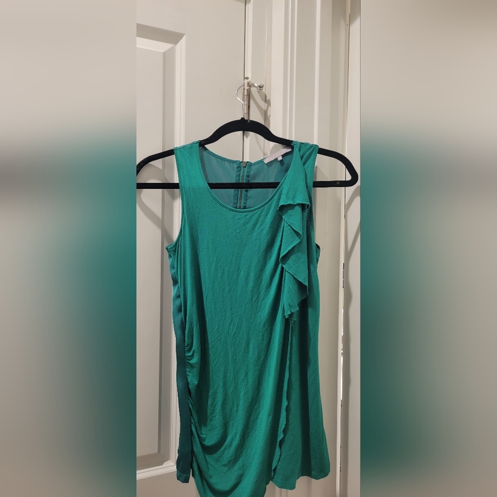 Beautiful green blouse with silk back.